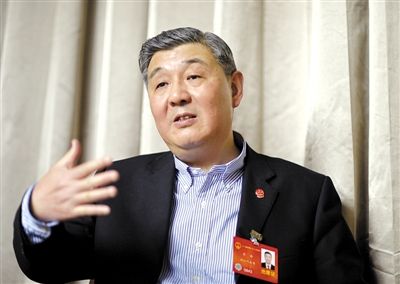 今年全國兩會期間，全國人大代表、浙江高院院長齊奇接受記者采訪。新京報記者 陳杰 攝