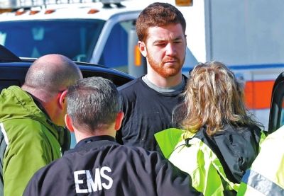 嫌犯接受詢問。新華社/美聯(lián)