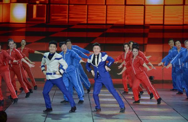 《小蘋果》、《最炫民族風(fēng)》等廣場舞曲將會有全國統(tǒng)一、編排科學(xué)、帶給人正能量的全新動作。 CFP 資料