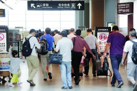 近期乘飛機應(yīng)留足更多的時間以免誤機。/晨報記者 殷立勤