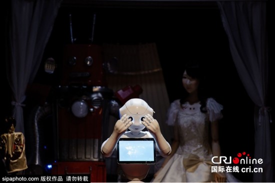 日本首個(gè)機(jī)器人婚禮于東京舉行 日本首個(gè)機(jī)器人婚禮于東京舉行