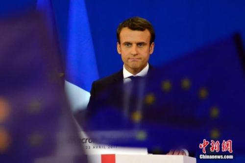 圖為馬克龍在慶祝集會上。中新社記者 龍劍武 攝