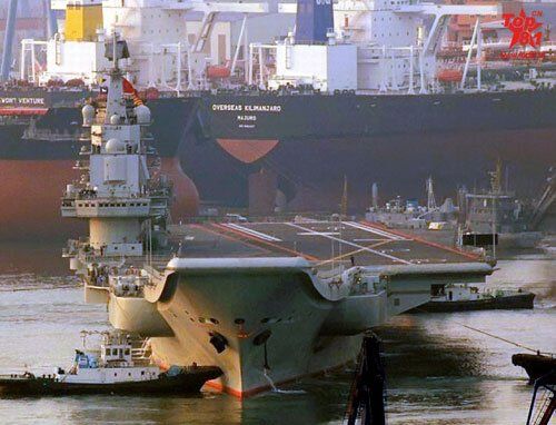 資料圖：中國航母離開碼頭出海試航。