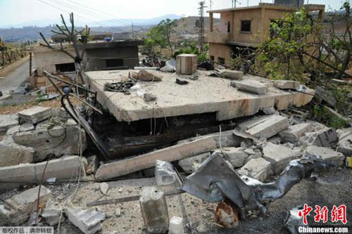 資料圖：當地時間5月5日凌晨。以色列對3處敘利亞軍事場所進行空襲，造成平民傷亡和大規(guī)模破壞，空襲威脅